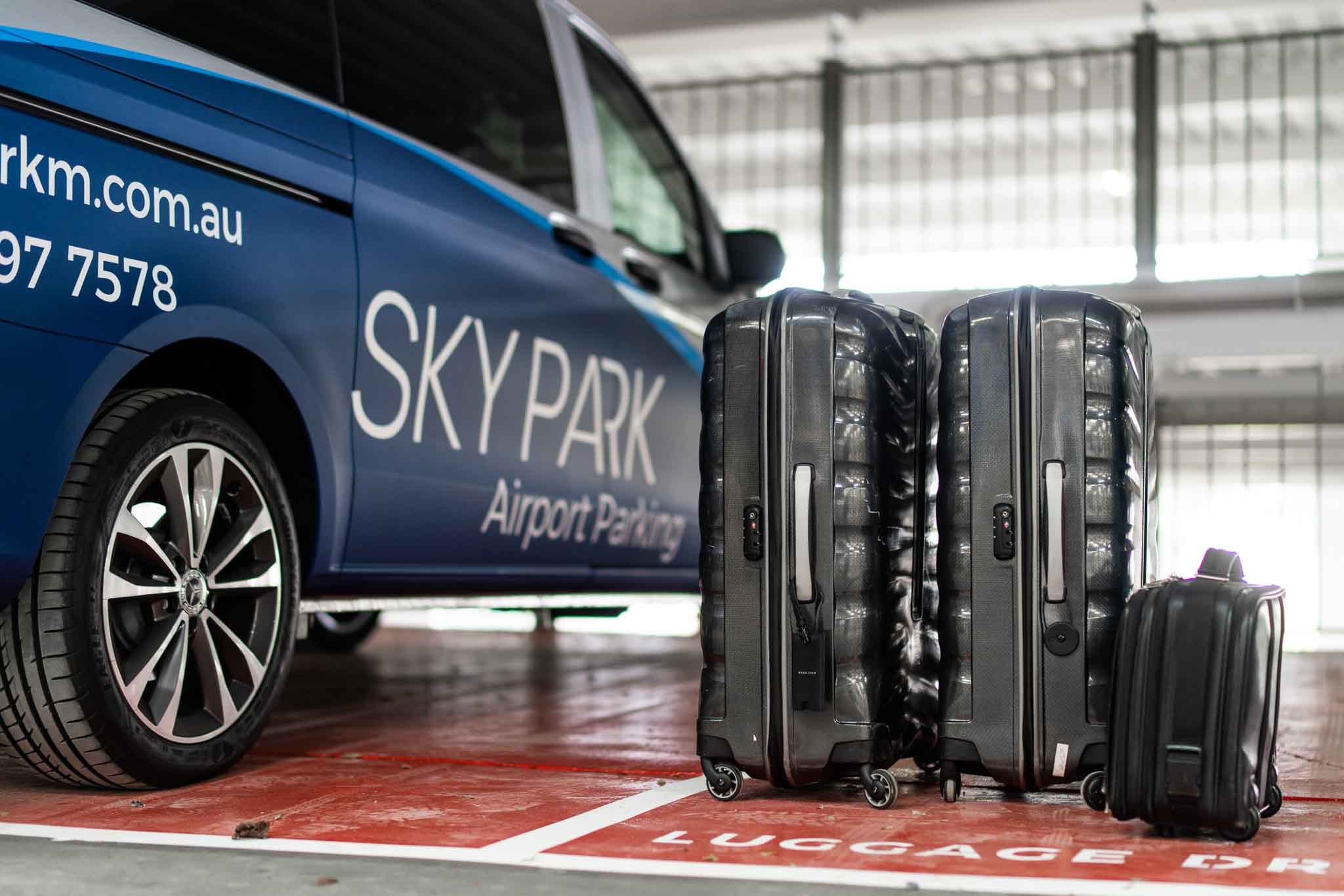 Luggage next to SkyPark Airport Shuttle